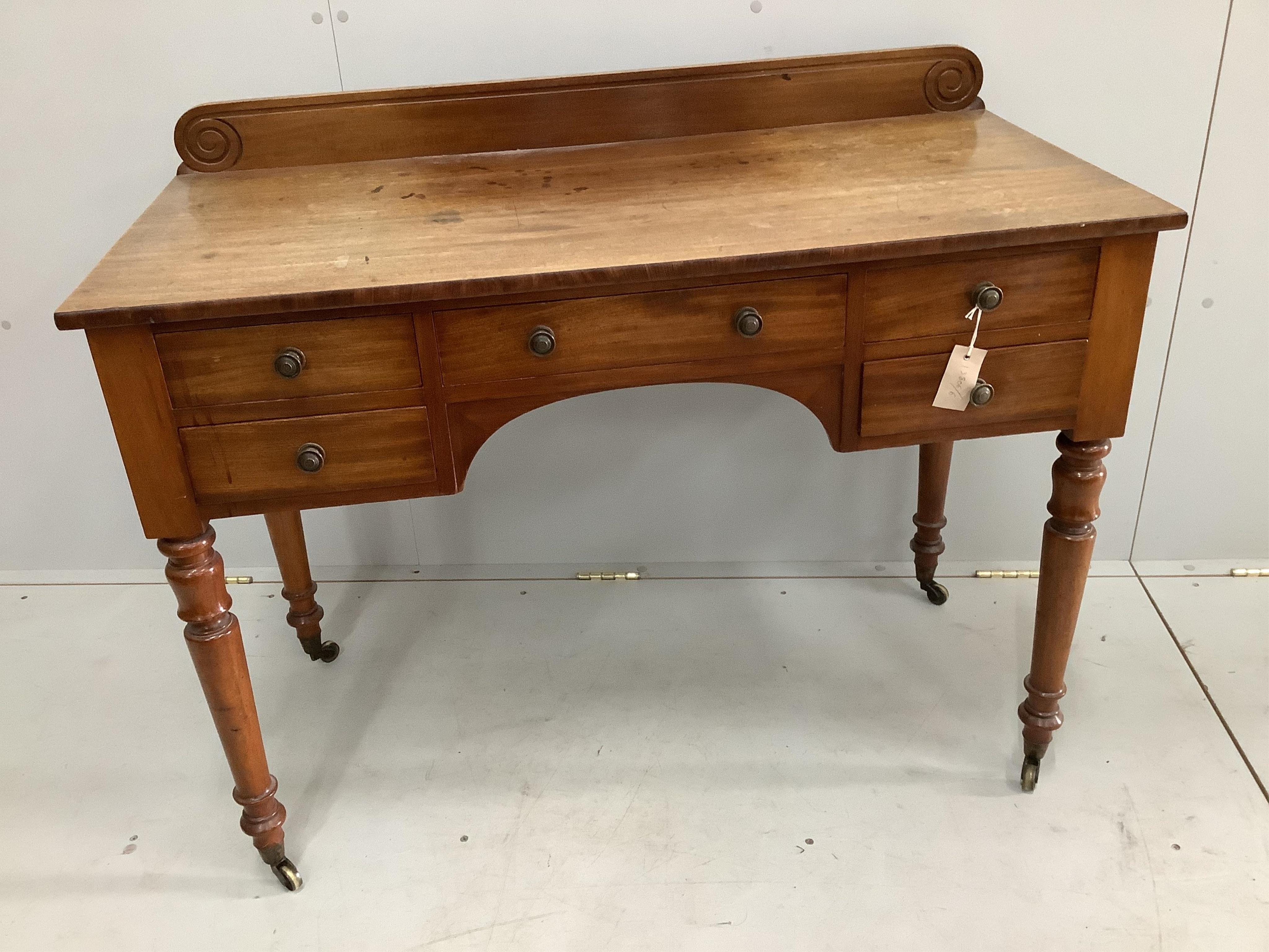 An early Victorian mahogany kneehole dressing table, width 106cm, depth 52cm, height 84cm